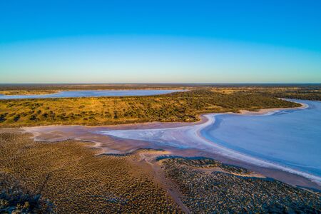 Salt lakes in Murray-Sunset National Park at sunset - aerial viewの写真素材