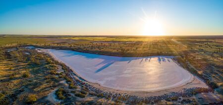 Pink salt lake Hardy at sunset - aerial panoramic landscapeの写真素材