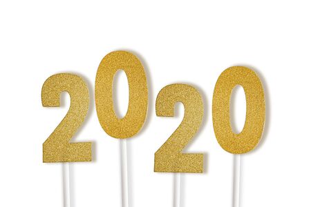 Number 2020 with golden glitter and shadows isolated on white backgroundの写真素材