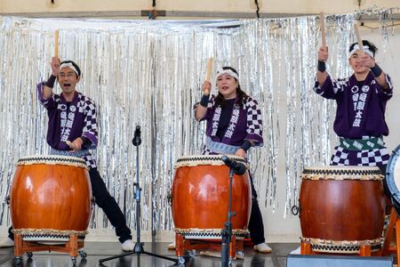 Melbourne, Australia - October 6, 2019: Three drummers during live performanceのeditorial素材