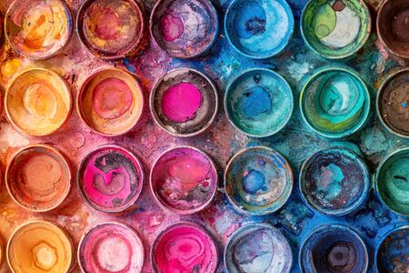 Closeup of used watercolor palette - beautiful vivid colorsの写真素材