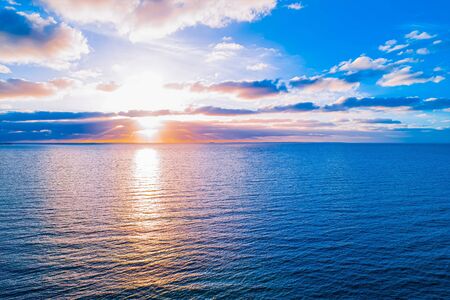 Beautiful sunset over water - minimalist seascapeの写真素材