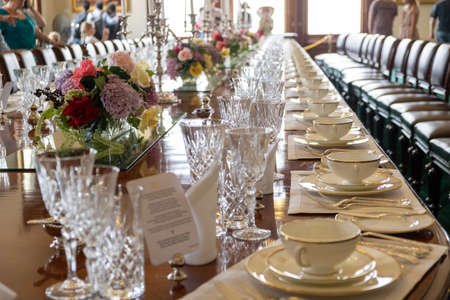 Melbourne, Australia - January 26, 2020: Government House dining room elescopic table closeup