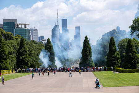 Melbourne, Australia - January 26, 2020: Tourists gather to watch cannon fire on Shrine of Remembrance promenade on Australia Dayのeditorial素材