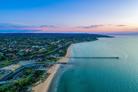 Aerial view of Frankston waterfront and Mornington Peninsula coastline at dusk in Melbourne, Australiaの写真素材