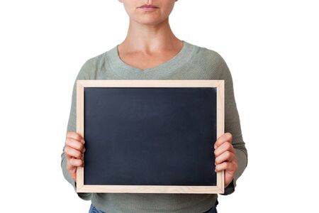 Female holding small framed blackboard with copy space in front of her body