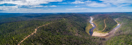 Wide aerial panorama of Snowy River National Park on a summer dayの写真素材