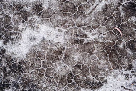 Dry cracked sand abstract background textureの写真素材