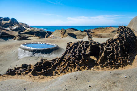 Bare foot footprint on beach sand with copy spaceの写真素材