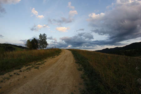 Dirt road in the mountainsのeditorial素材