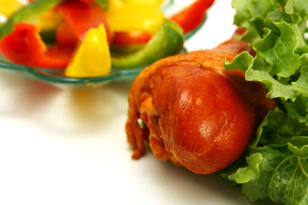 roasted turkey close up with raw vegetablesの写真素材