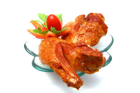 chicken wings served on transparent dishの写真素材