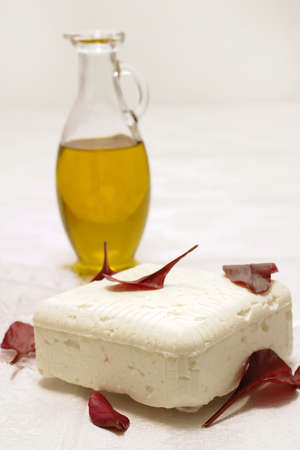 white goat cheese and olive oilの写真素材