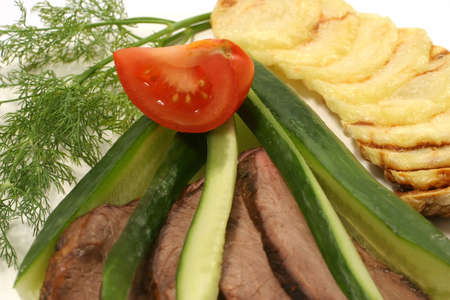 roast beef cucumber, fried potato and fennelの写真素材