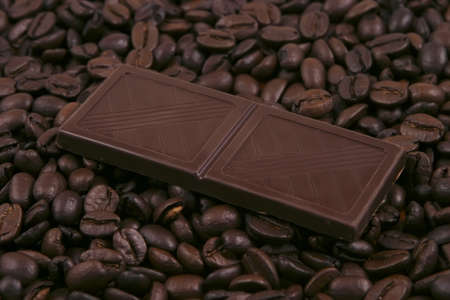 chocolate slice on coffee grain