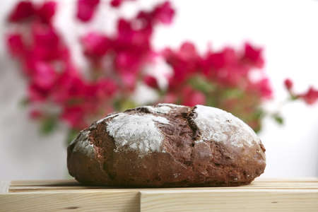 rye bread on wooden plateの写真素材