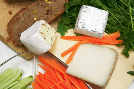 delicatessen cheeses on tableの写真素材