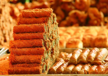 sweet oriental pastry and cakes on market show window