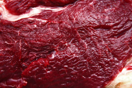 red fresh ripe uncooked beef close up