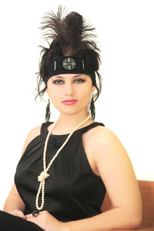 retro style girl posing to on white backgroundの写真素材