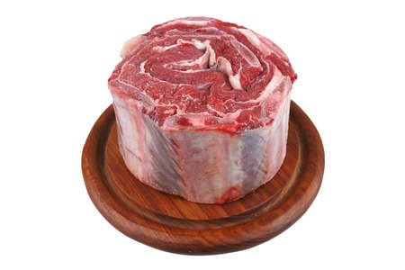 bunch of meat on wood shelf over whiteの写真素材