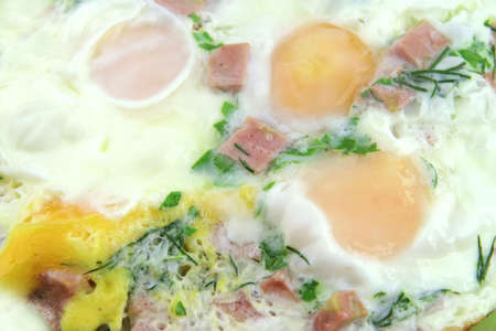 three fried eggs very close upの写真素材
