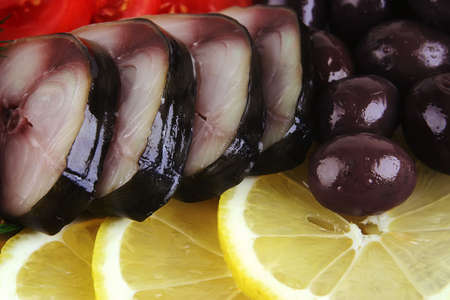 smoked fish served with vegetables top viewの写真素材