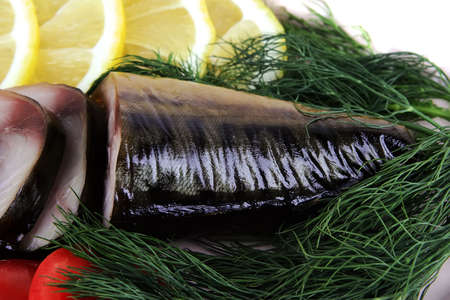 smoked fish back part close up with fennelの写真素材