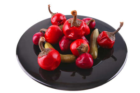 snakes served on black dish over white backgroundの写真素材