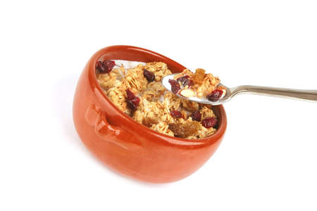 pot full of granola with nuts and drain berry