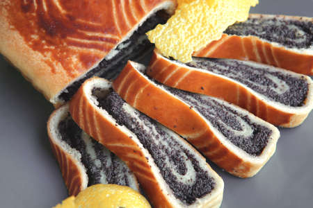 poppy pie served on dish with lemonの写真素材