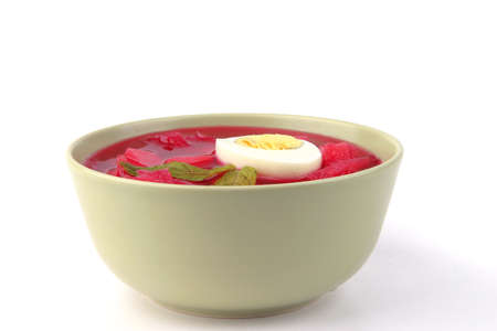 fresh beet vegetable soup in green bowlの写真素材