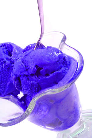 pink color ice cream in glass over whiteの写真素材