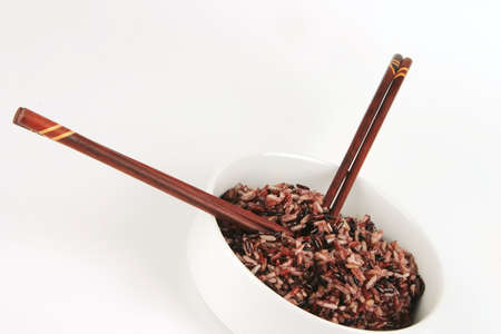 dark mixed rice in white bowl with soyの写真素材