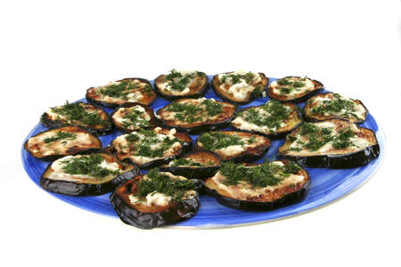 served grilled egg plant on blue plateの写真素材