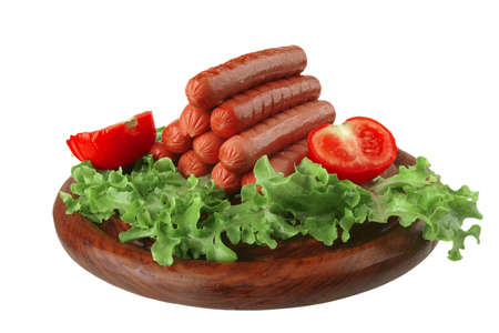 grilled beef red sausages on wooden plateの写真素材