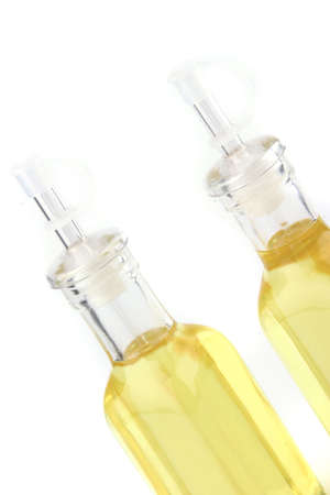 olive oil bottles isolated over white backgroundの写真素材
