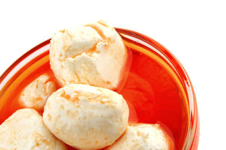 mozzarella cheese spiced served over white backgroundの写真素材