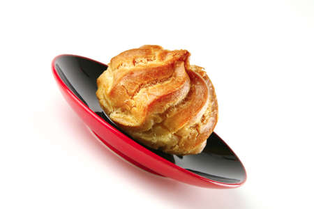 fresh creamy eclair cakes served on whiteの写真素材