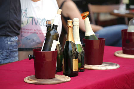 bottles of wine served on open cafeの写真素材