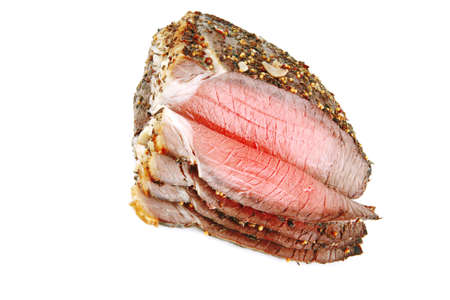 whole roast beef slice isolated over white の写真素材