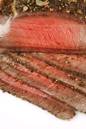 served roast slice isolated over white backgroundの写真素材