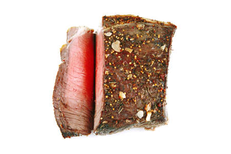whole roast beef slice isolated over white の写真素材