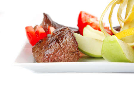 beef meat served on dish with vegetablesの写真素材