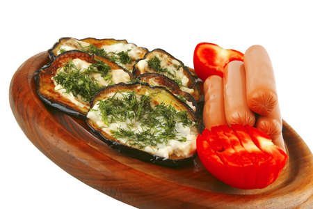 sausages served on plate with grilled eggplantの写真素材