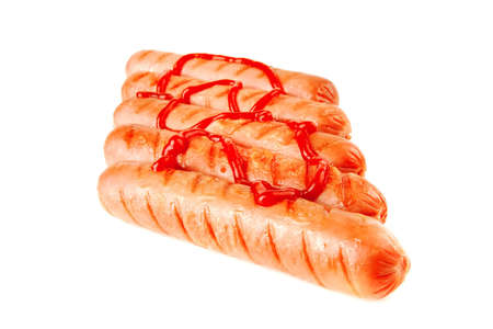 served beef red sausages with ketchup over white の写真素材