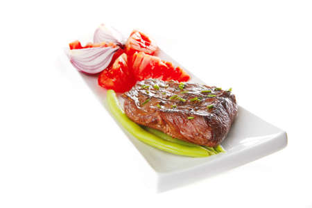 roast beef meat served with tomato on ceramic
の写真素材