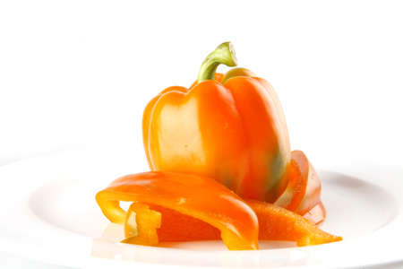 light orange bell pepper isolated over white