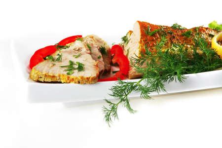 roast tuna chunk served on white porcelain plateの写真素材