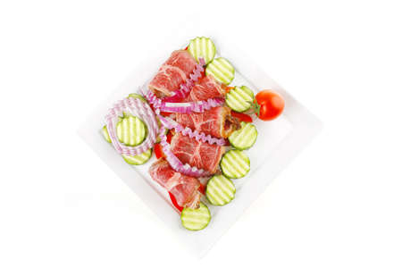 fresh roasted meat rolls on white platterの写真素材